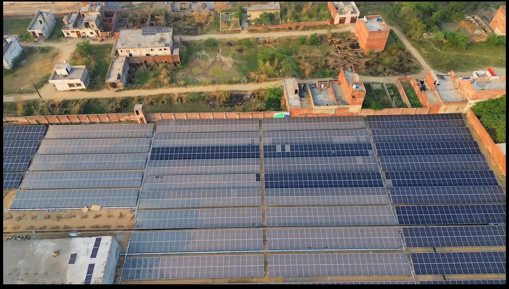 Aerial view of the 5 MWp industrial solar array at Bashir Sons Steel Industry, Kala Shah Kaku